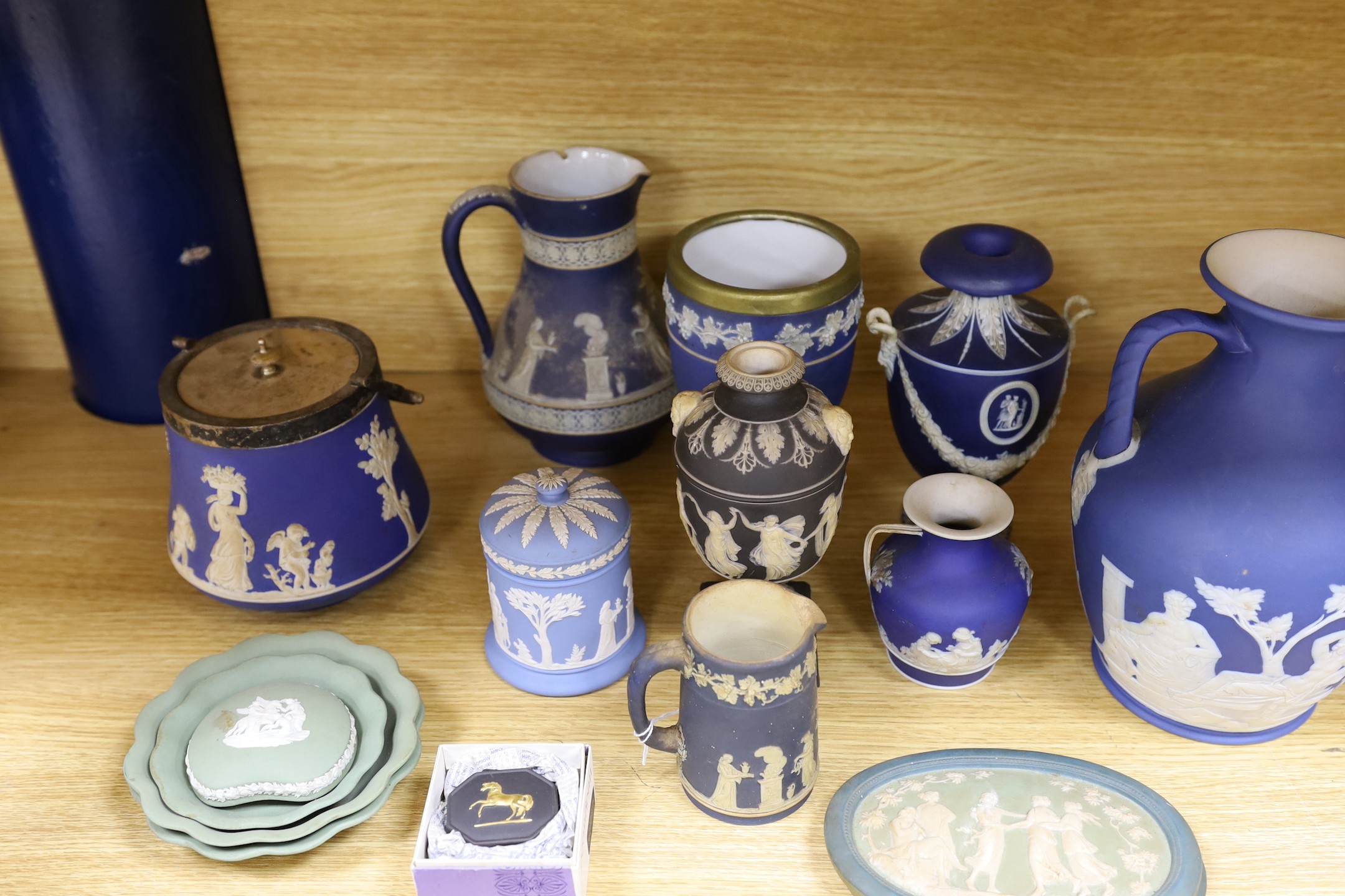A collection of Victorian and later Jasperware, including a 19th century Wedgwood version of the Portland vase, 23 cms high